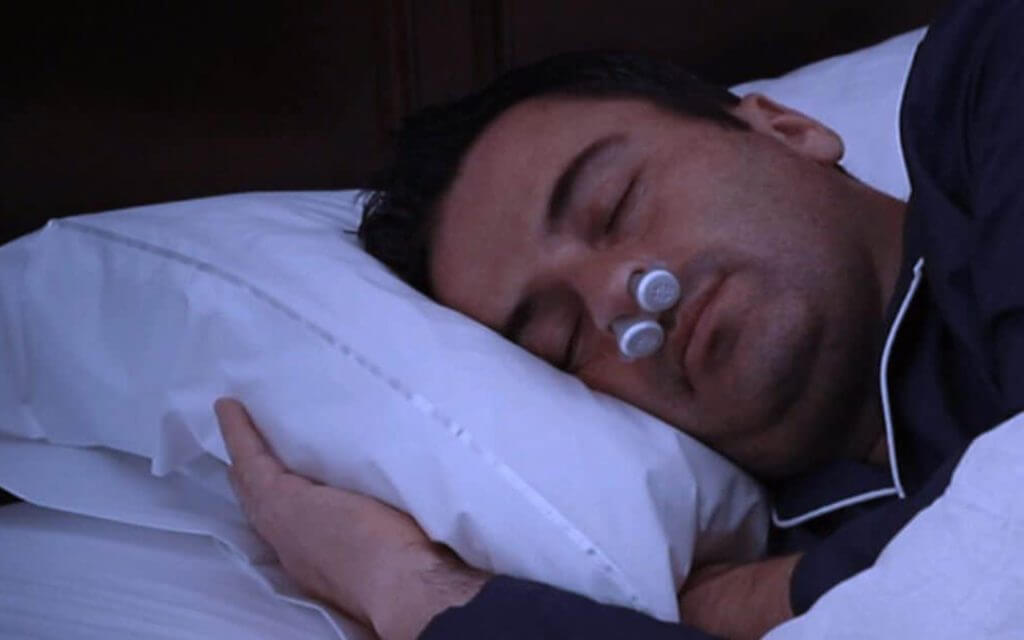 Man Sleeping with Bongo Rx New CPAP Alternative Treatment for Mild to Moderate Obstructive Sleep Apnea